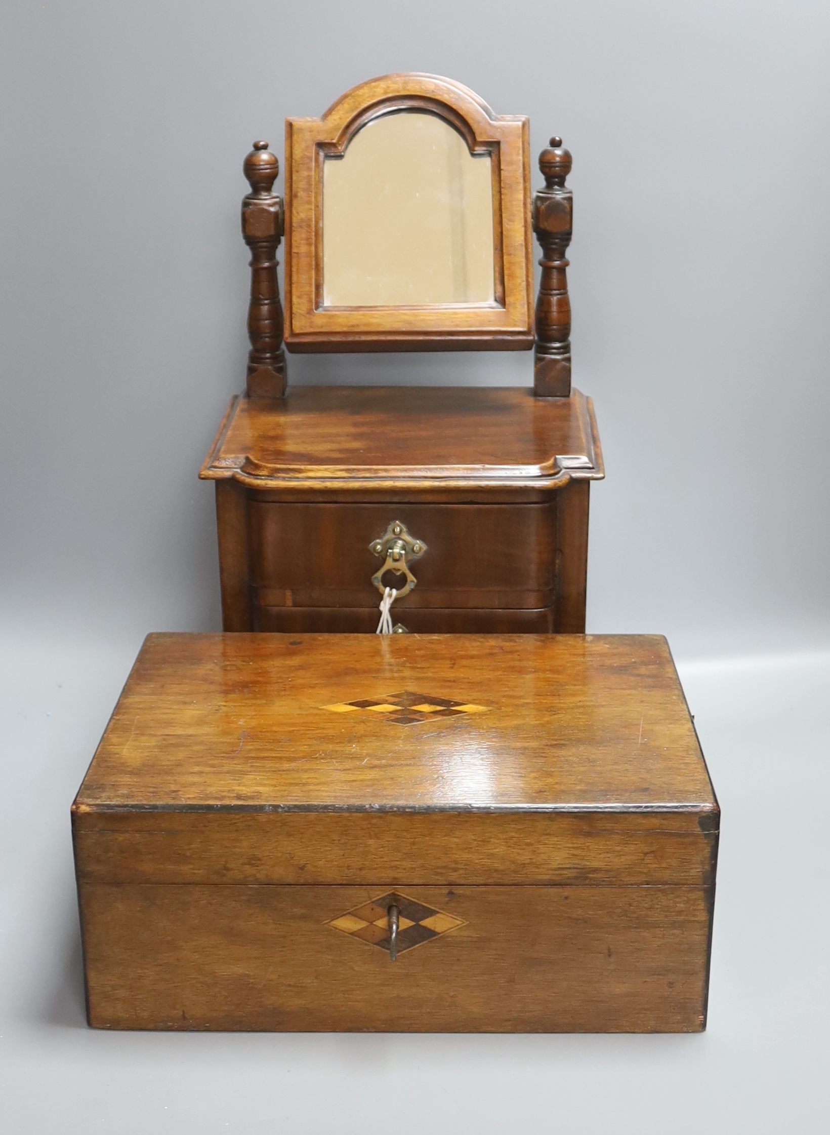 A Victorian walnut workbox and a miniature mahogany chest, height 42cm